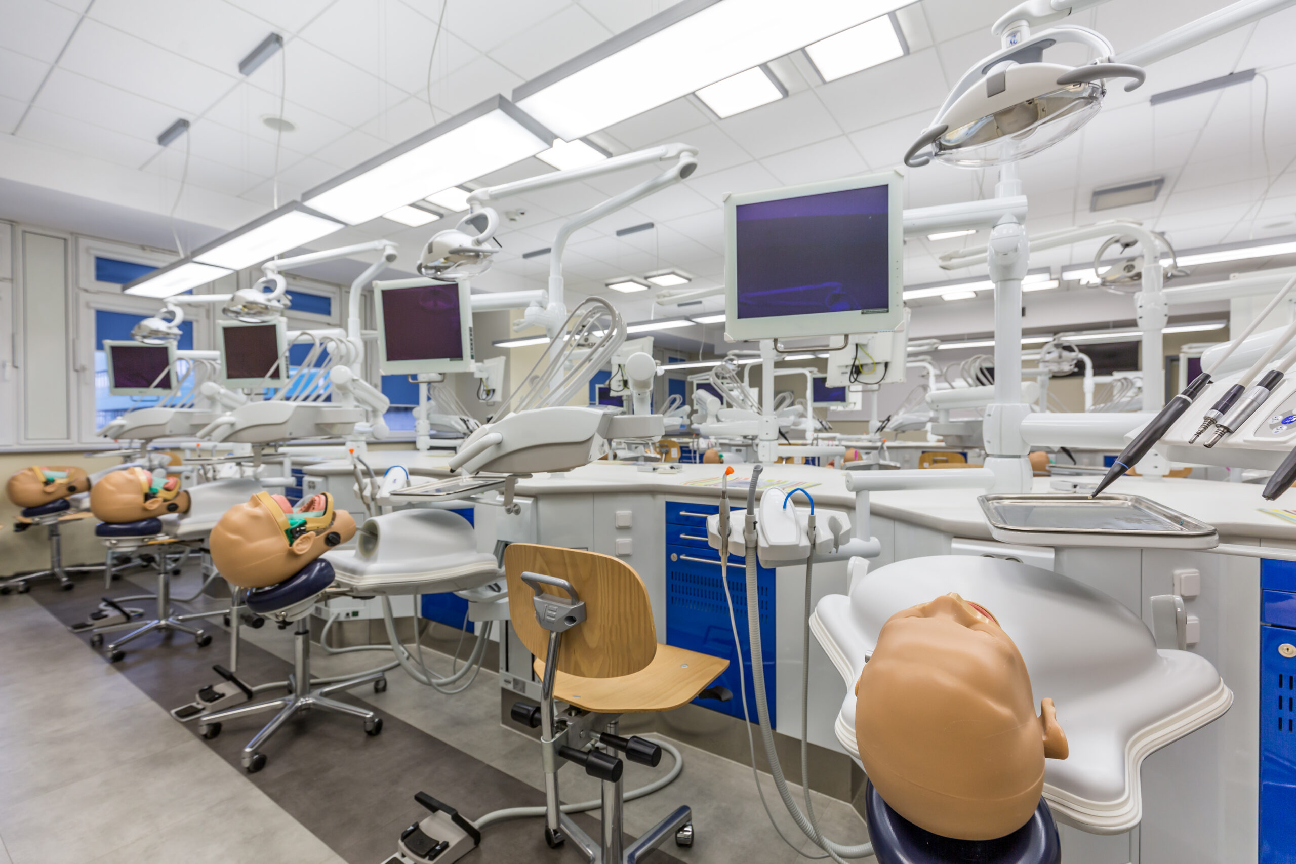 State-of-the-art dental school classroom with modern equipment and workstations