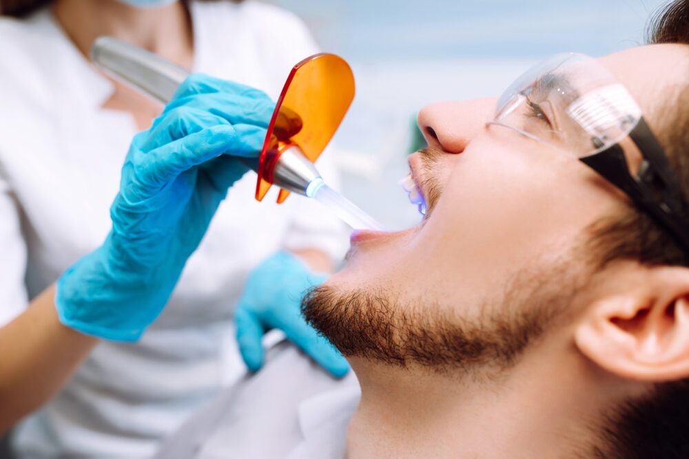 Young man receiving dental treatment at Pecan Tree Family Dentistry in McKinney, TX
