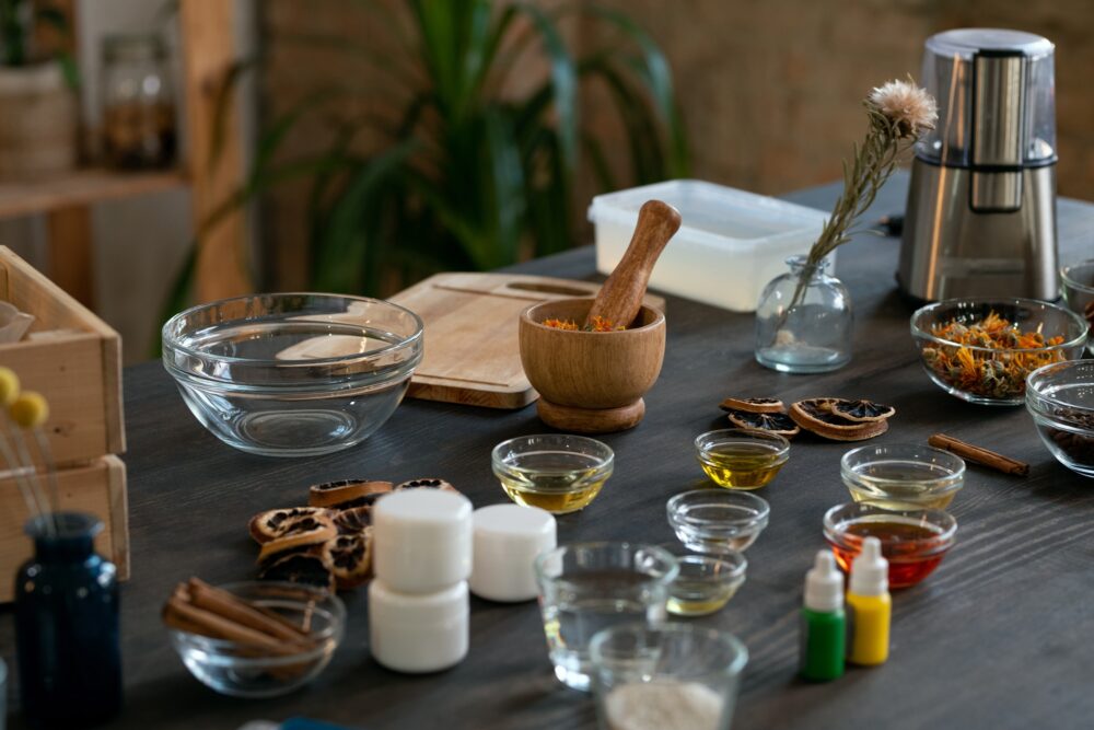 Herbal dental care setup with essential oils and dried herbs